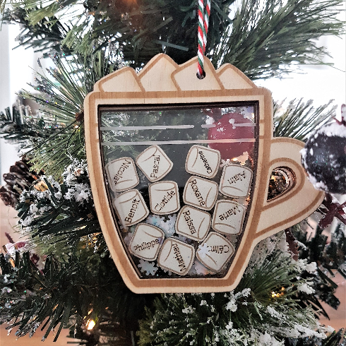 Canadian holiday decorations - A wooden ornament of a hot cocoa mug with custom name marshmallows