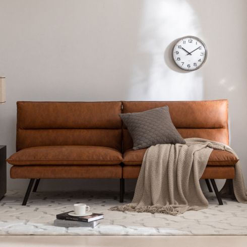 A convertible sofa from Wayfair made of faux leather