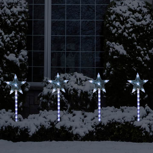 Outdoor Holiday Lighting Trends - A set of four holiday garden stakes