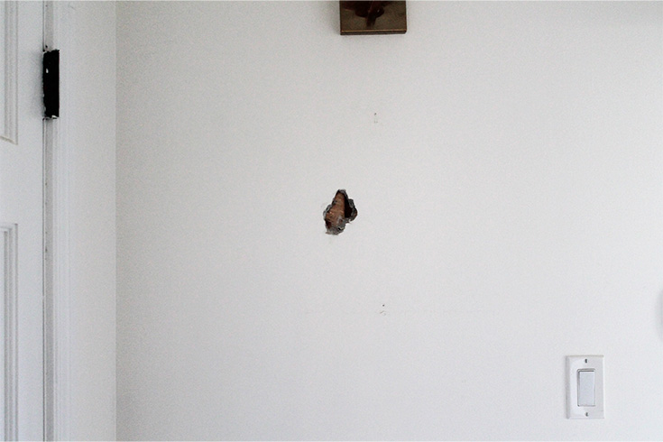 Assessing a hole in a wall in order to patch it