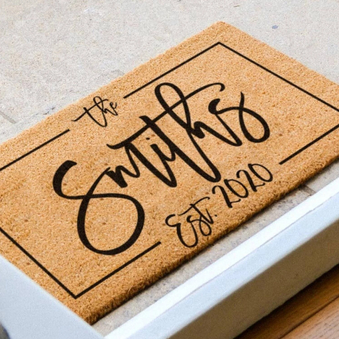 A customized doormat with the name 