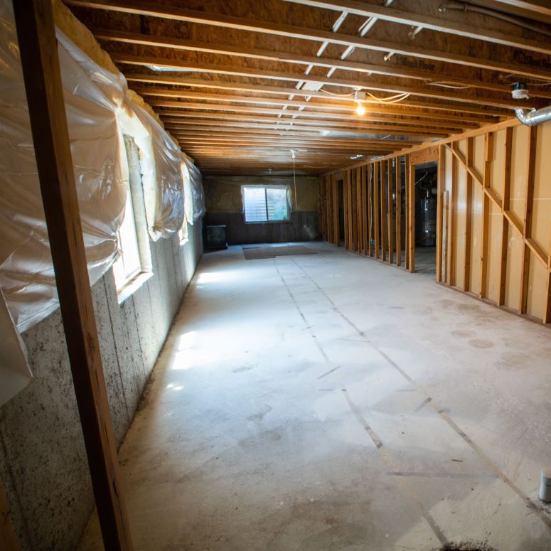 unfinished basement with cinder block walls
