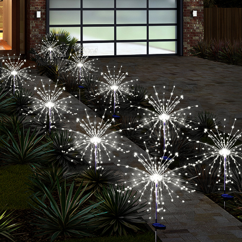 Outdoor Holiday Lighting Trends - A walkway lined with LED garden stakes