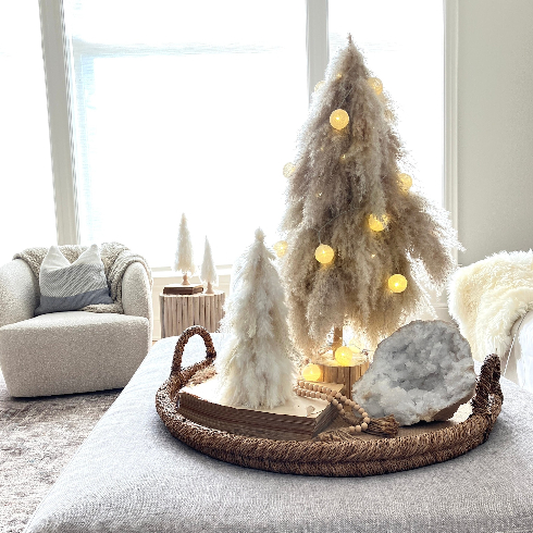 Canadian holiday decorations - A lovely neutral living room with a handmade pampa holiday tree