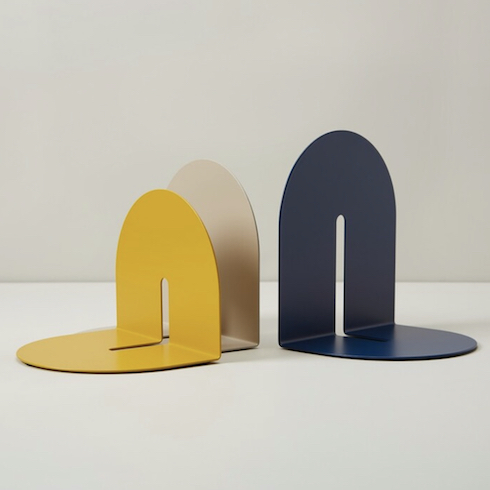 Gift idea - Set of three OUI modern steel bookends are a fun and functional addition to any living or workspace with their mod, retro-inspired look and a modern matte powder-coat finish for durable yellow, beige and navy colour