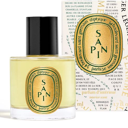 Gift idea - Diptyque Sapin (Pine Tree) home scent bottle spray and box on a white background