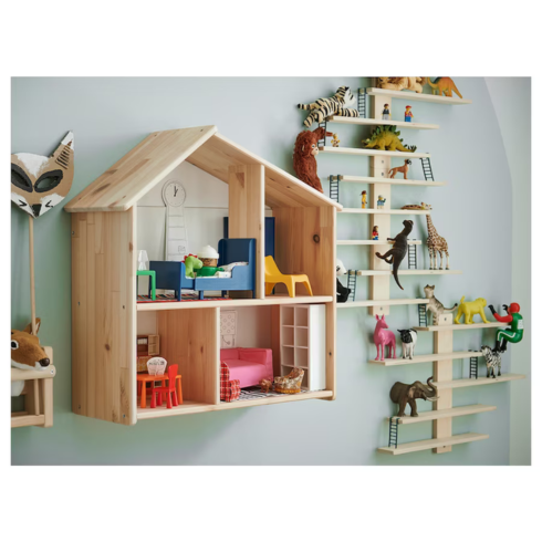 a small doll house mounted on a wall with knick knacks