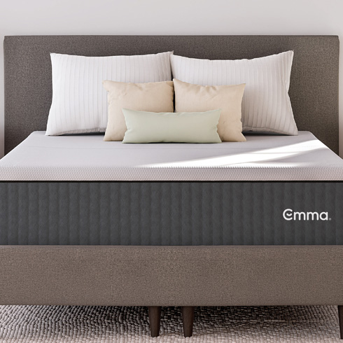 Emma Sleep mattress with pillows on top