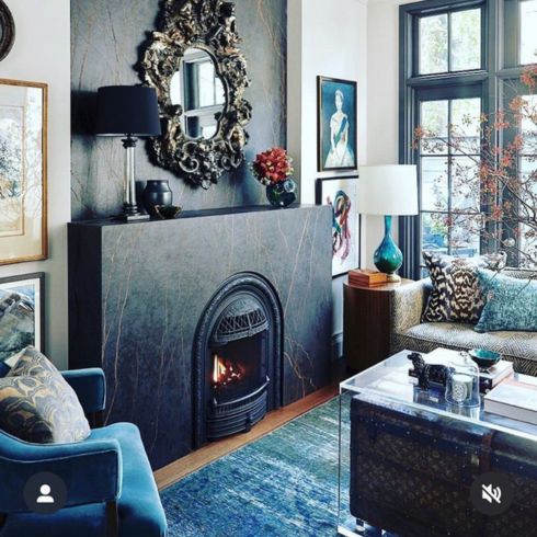 Black fireplace in traditional living room