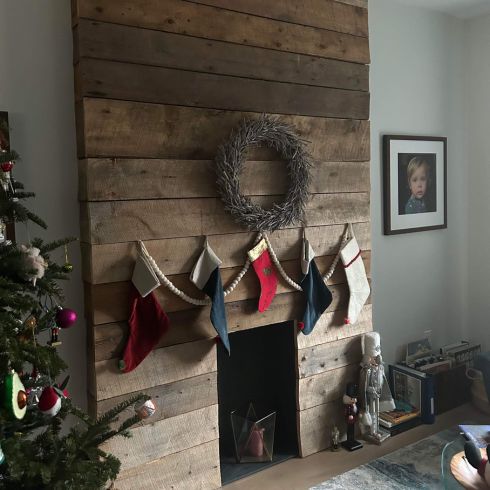 Rustic fireplace made of old barnboard