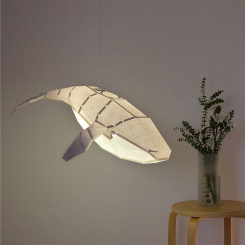 A floating paper whale lamp from Etsy