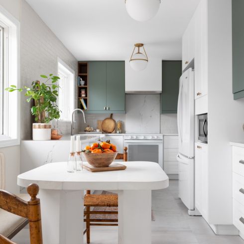 Green and white galley kitchen