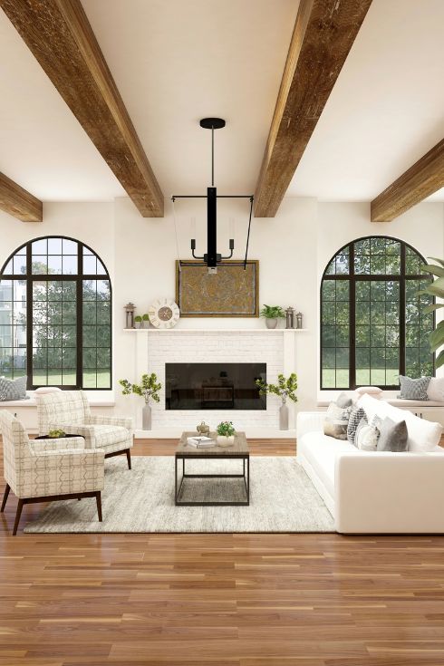 Grey/beige living room with high ceilings featuring wooden beams