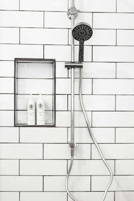 Subway tile shower with recessed shelf
