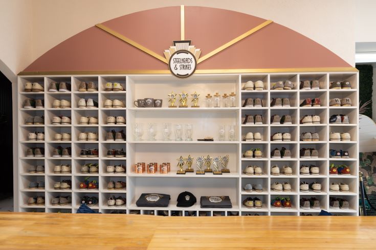 Art-deco style wall of bowling shoes