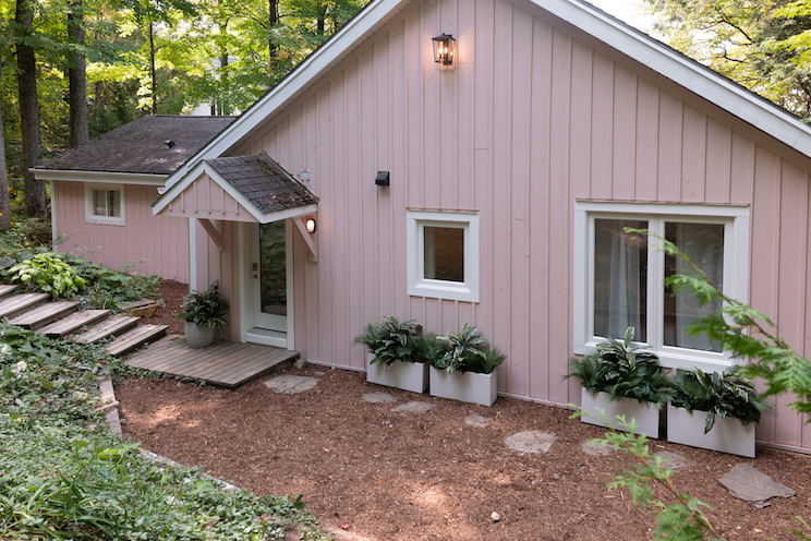 Pink cottage with white trim
