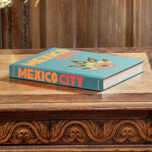 A Mexico City coffee table book sitting on a side table