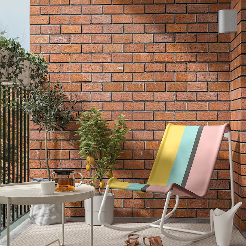 The colourful Tumholmen rocking chair from IKEA on a cozy patio space