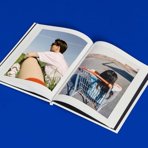 A hardcover photo book that buyers can put together using their own personal photos at Black’s