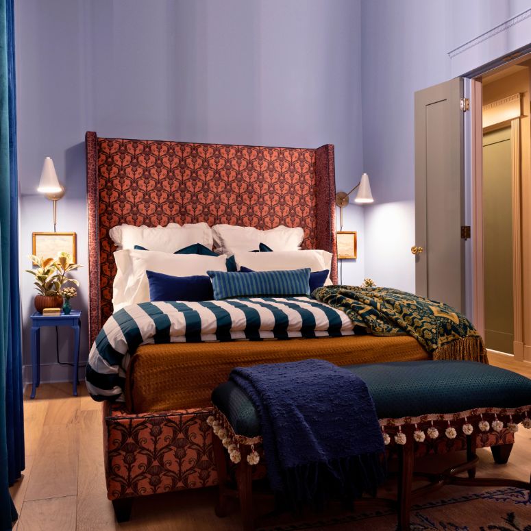 Century home bedroom with blue walls and accents