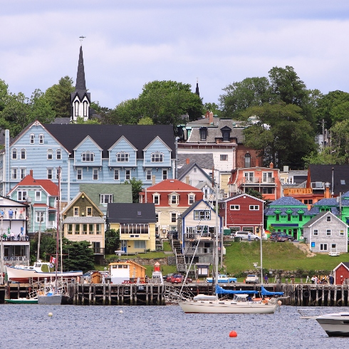 Colourful seaside houses along the waterfront in Lunenburg, Nova Scotia.