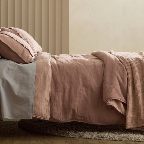 Beautiful soft pink muslin blankets and bed sheets by Silk & Snow